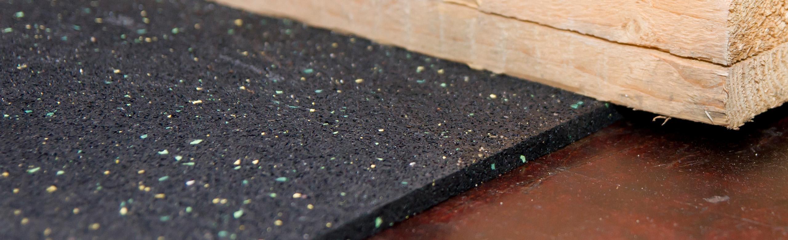 Anti-slip mat for securing loads in use 